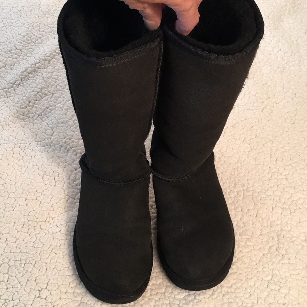 Tall black UGG boots